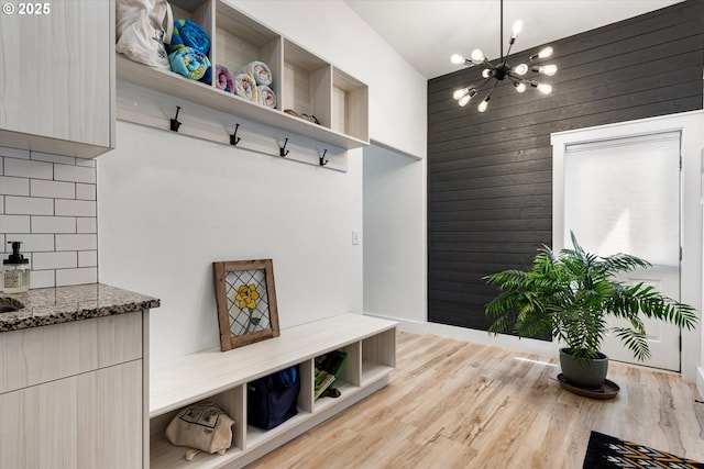 1905 2nd St, Baker City, OR 97814 - mudroom with wooden walls, a chandelier, wood finished floors, and baseboards