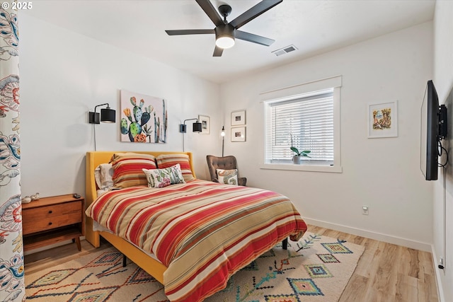 1905 2nd St, Baker City, OR 97814 - bedroom featuring wood finished floors, baseboards, and ceiling fan