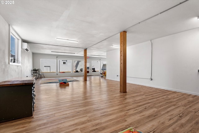 1905 2nd St, Baker City, OR 97814 - exercise area with light wood-style floors and a wall mounted AC