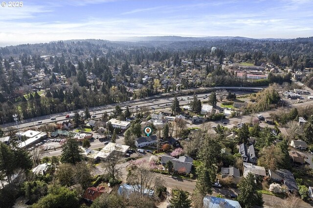 7820 SW 17th Dr, Portland, OR 97219 - aerial overview of property's location featuring a forest
