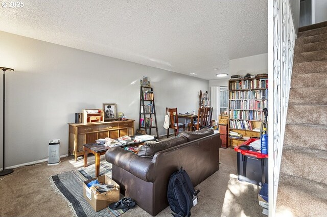 7820 SW 17th Dr, Portland, OR 97219 - living room with carpet, a textured ceiling, and stairs