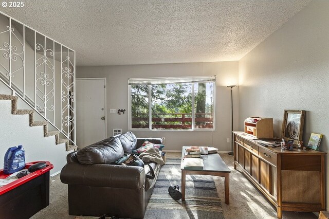 7820 SW 17th Dr, Portland, OR 97219 - living room with a textured ceiling, carpet, baseboards, and stairs
