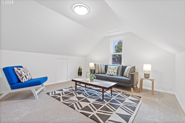 sitting room featuring lofted ceiling and carpet floors