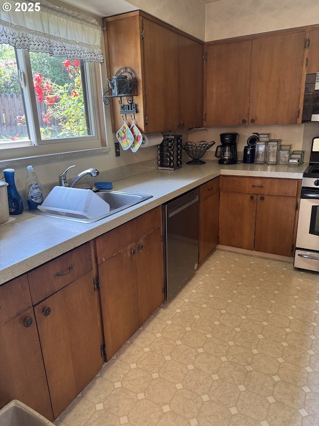 10930 SW 61st Ave, Portland, OR 97219 - kitchen with dishwasher, white range with electric stovetop, light flooring, and light countertops