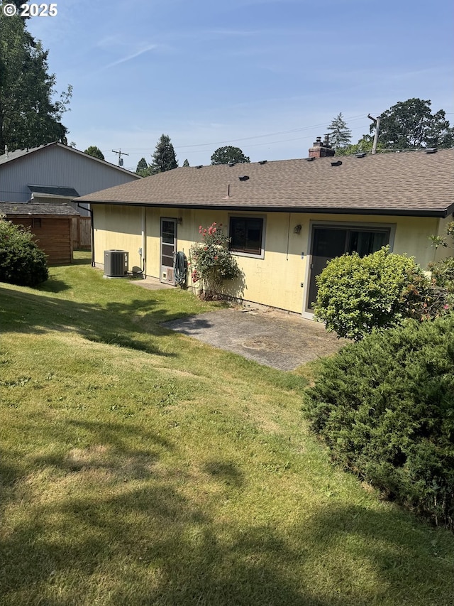 10930 SW 61st Ave, Portland, OR 97219 - back of house with a lawn and roof with shingles