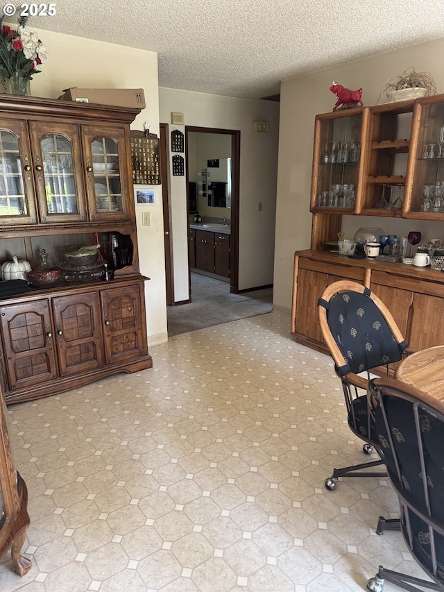 10930 SW 61st Ave, Portland, OR 97219 - bar area featuring a textured ceiling and tile patterned floors