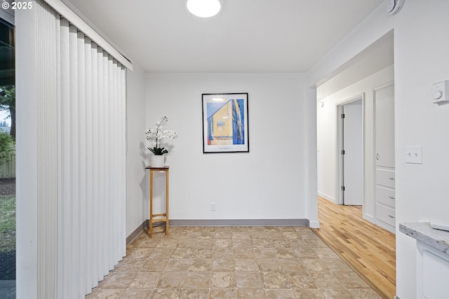 corridor featuring light hardwood / wood-style floors