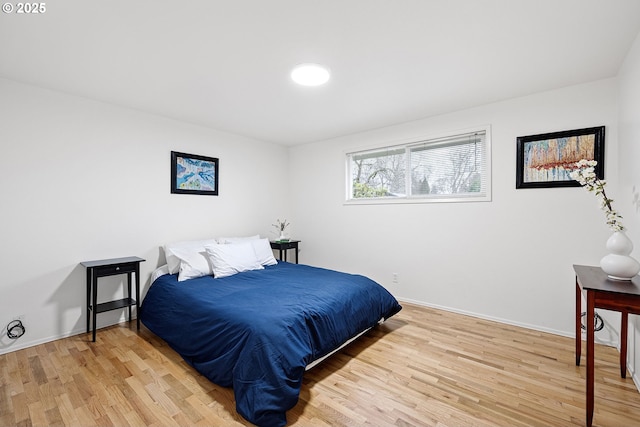 bedroom featuring hardwood / wood-style flooring