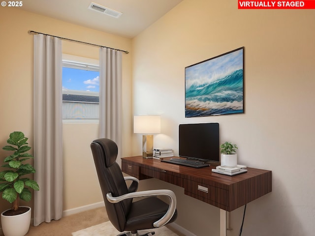 office space featuring visible vents, baseboards, and carpet