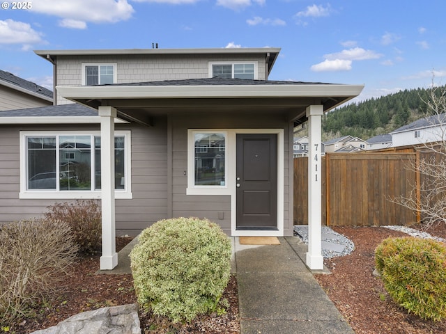 property entrance with fence