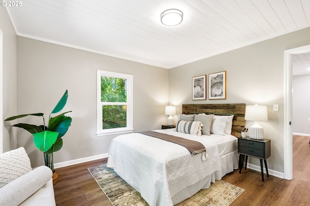 91822 Rulyville Rd, Westport, OR 97016 - bedroom with baseboards, wood finished floors, crown molding, and wood ceiling