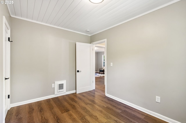 91822 Rulyville Rd, Westport, OR 97016 - unfurnished room with baseboards, dark wood-type flooring, and ornamental molding