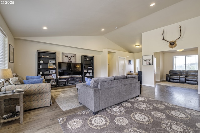 10764 Wiseacre Ln NE, Aurora, OR 97002 - living room with lofted ceiling, wood finished floors, recessed lighting, and baseboards