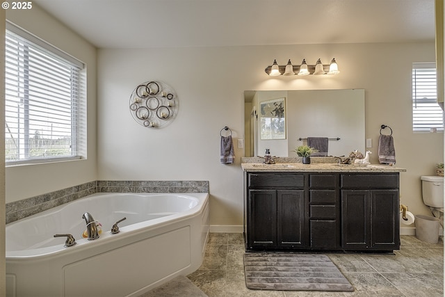 10764 Wiseacre Ln NE, Aurora, OR 97002 - full bath with a garden tub, toilet, healthy amount of natural light, and double vanity