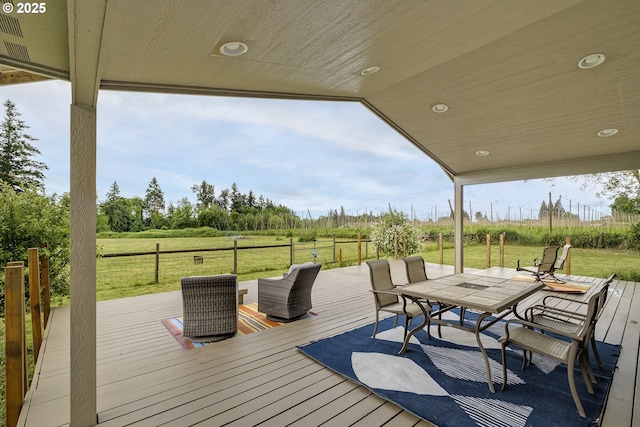 10764 Wiseacre Ln NE, Aurora, OR 97002 - deck featuring outdoor dining area and a lawn
