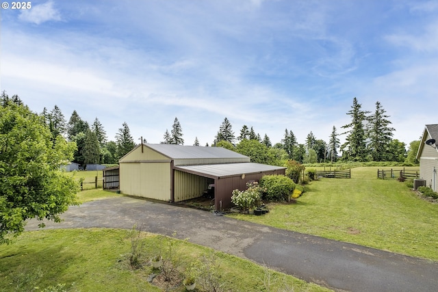 10764 Wiseacre Ln NE, Aurora, OR 97002 - view of yard with a pole building, central AC unit, and an outdoor structure