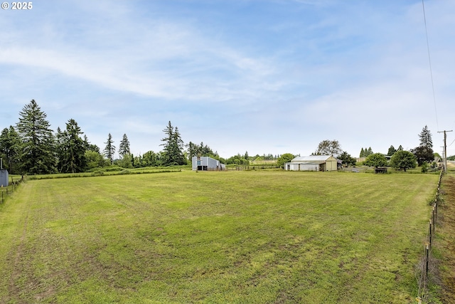 10764 Wiseacre Ln NE, Aurora, OR 97002 - view of grassy yard with a view of rural / pastoral area, a pole building, and an outbuilding