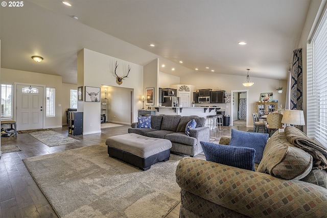 10764 Wiseacre Ln NE, Aurora, OR 97002 - living area with high vaulted ceiling, light wood finished floors, baseboards, and recessed lighting