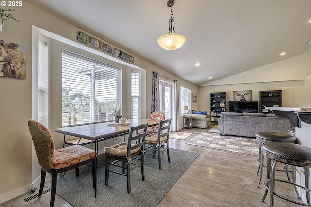 10764 Wiseacre Ln NE, Aurora, OR 97002 - dining area with vaulted ceiling, light wood-style flooring, and recessed lighting