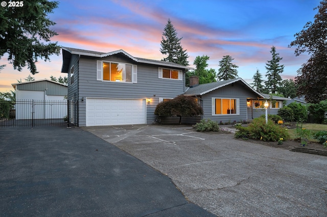 11184 S Allen Ct, Oregon City, OR 97045 - view of front facade with asphalt driveway and an attached garage
