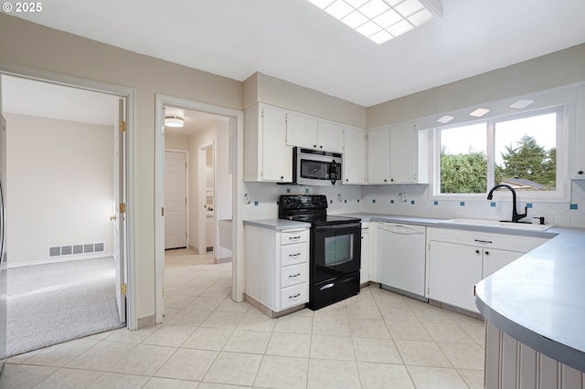 11184 S Allen Ct, Oregon City, OR 97045 - kitchen featuring black / electric stove, dishwasher, stainless steel microwave, light countertops, and tasteful backsplash