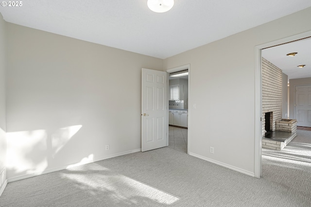 11184 S Allen Ct, Oregon City, OR 97045 - unfurnished bedroom with carpet flooring and a fireplace
