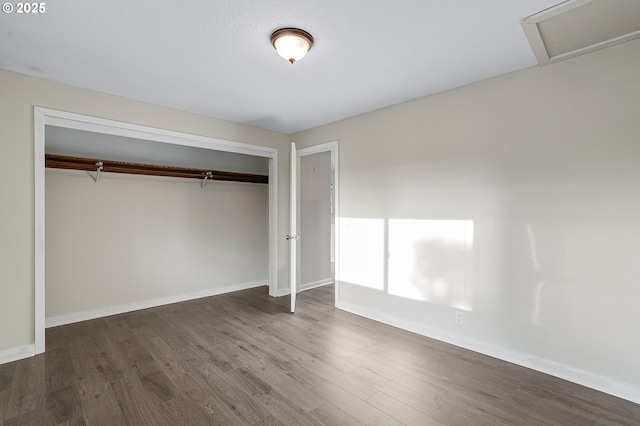 11184 S Allen Ct, Oregon City, OR 97045 - unfurnished bedroom with dark wood finished floors, a closet, and attic access