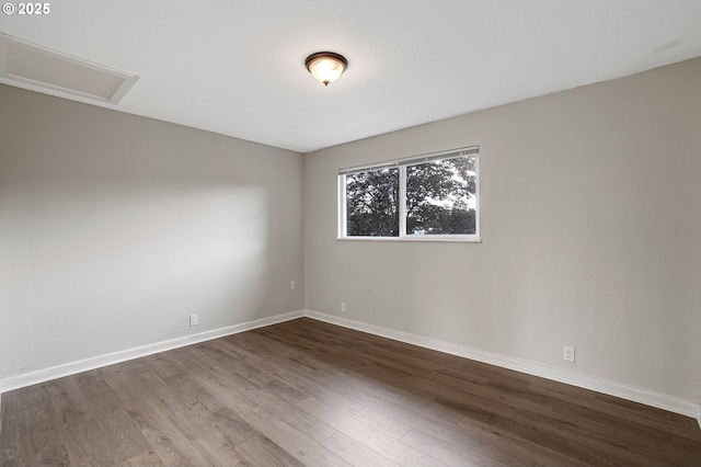 11184 S Allen Ct, Oregon City, OR 97045 - unfurnished room featuring attic access and dark wood-type flooring