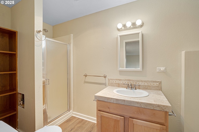 11184 S Allen Ct, Oregon City, OR 97045 - bathroom featuring a shower stall, wood finished floors, and vanity