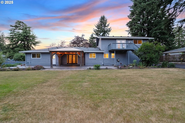 11184 S Allen Ct, Oregon City, OR 97045 - view of front of house featuring a front yard, a patio area, and a chimney