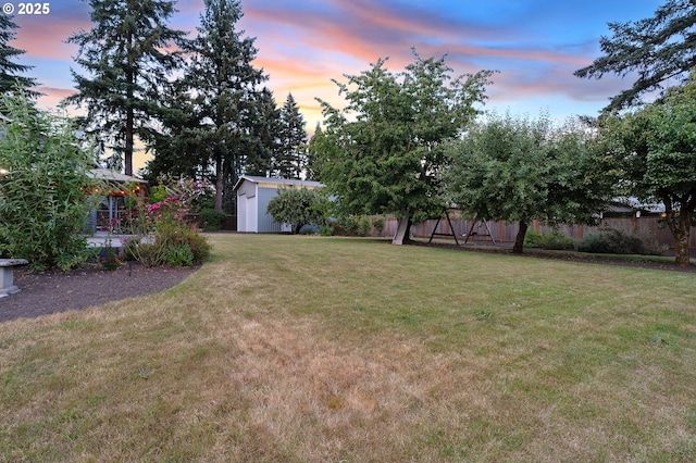 11184 S Allen Ct, Oregon City, OR 97045 - yard at dusk featuring a storage unit