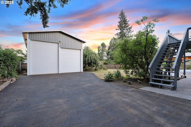 11184 S Allen Ct, Oregon City, OR 97045 - garage at dusk featuring a detached garage