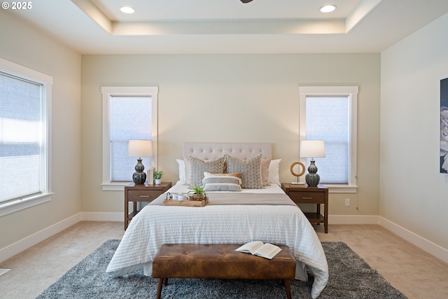 15152 NW Marie Way, Portland, OR 97229 - bedroom with a raised ceiling, light carpet, baseboards, and recessed lighting