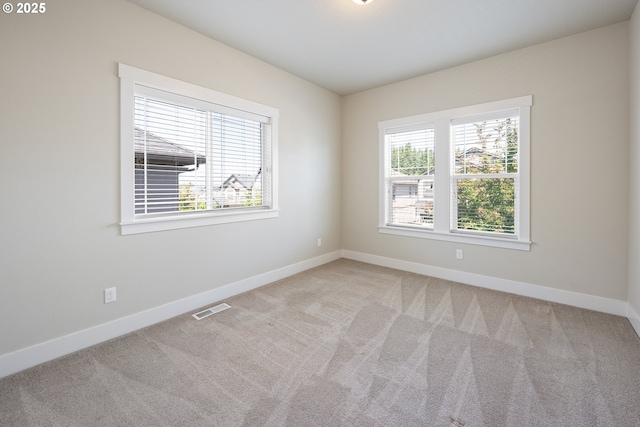 15152 NW Marie Way, Portland, OR 97229 - empty room with plenty of natural light and baseboards