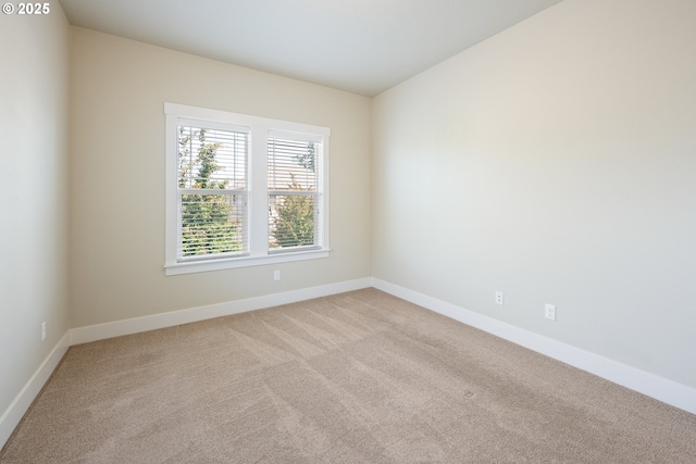 15152 NW Marie Way, Portland, OR 97229 - spare room with light colored carpet and baseboards