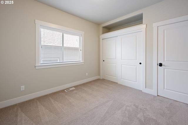15152 NW Marie Way, Portland, OR 97229 - unfurnished bedroom featuring carpet flooring, baseboards, and a closet