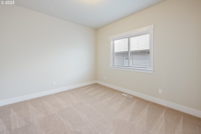 15152 NW Marie Way, Portland, OR 97229 - carpeted spare room featuring baseboards