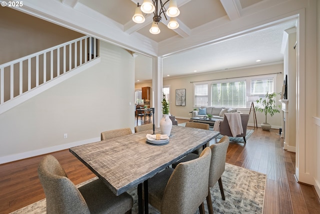 15152 NW Marie Way, Portland, OR 97229 - dining space featuring crown molding, dark wood-style floors, beam ceiling, baseboards, and coffered ceiling