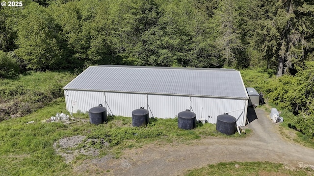 29100 Zimmerman Rd, Rainier, OR 97048 - view of pole building featuring a forest view