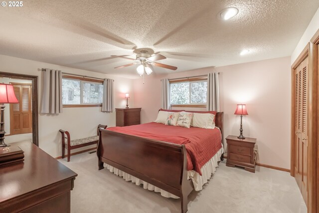 910 NW Overlook Dr, Corvallis, OR 97330 - unfurnished bedroom with a textured ceiling, connected bathroom, carpet floors, and baseboards