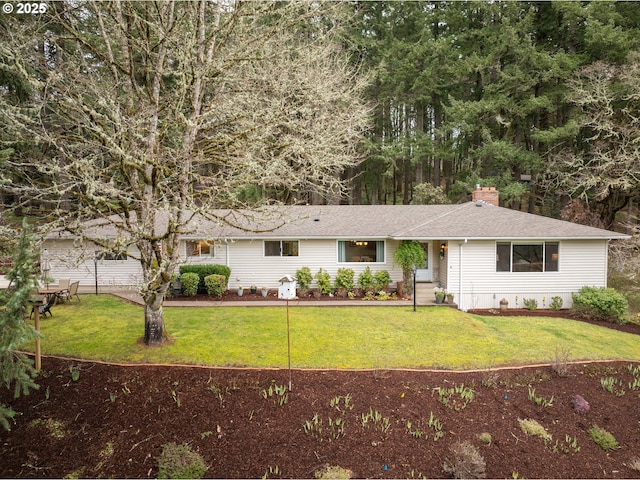 910 NW Overlook Dr, Corvallis, OR 97330 - kitchen with a sink, a peninsula, dark stone countertops, island range hood, and stainless steel appliances