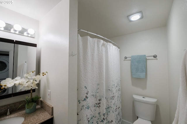 bathroom featuring vanity, toilet, and curtained shower