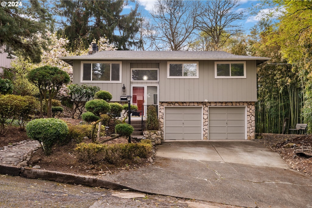 bi-level home featuring a garage