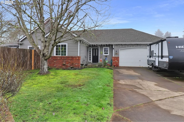 view of front of home with a garage and a front yard