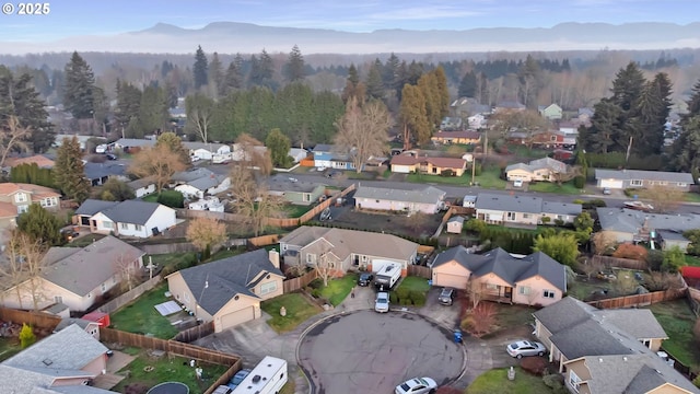 birds eye view of property with a residential view and a mountain view