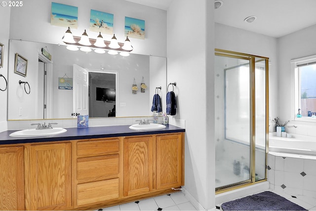 bathroom with shower with separate bathtub, tile patterned floors, and vanity