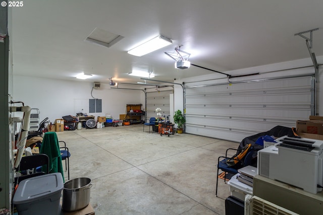 30258 King Ln, Hermiston, OR 97838 - garage with a garage door opener and electric panel