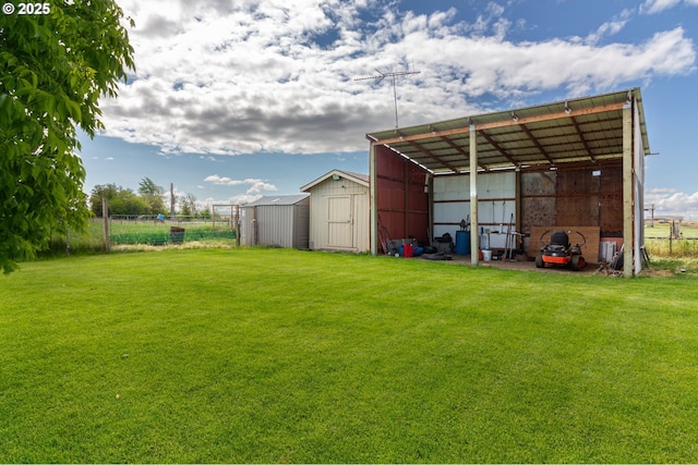 30258 King Ln, Hermiston, OR 97838 - view of yard featuring a detached carport and an outbuilding
