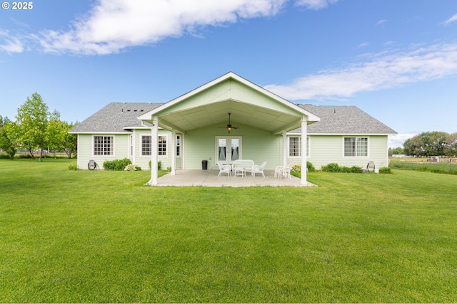 30258 King Ln, Hermiston, OR 97838 - rear view of house featuring a ceiling fan, a lawn, a patio, and a shingled roof