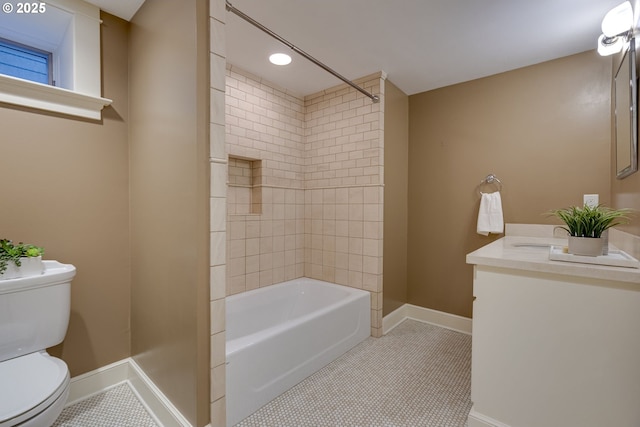 bathroom with baseboards, toilet, tile patterned flooring, vanity, and recessed lighting